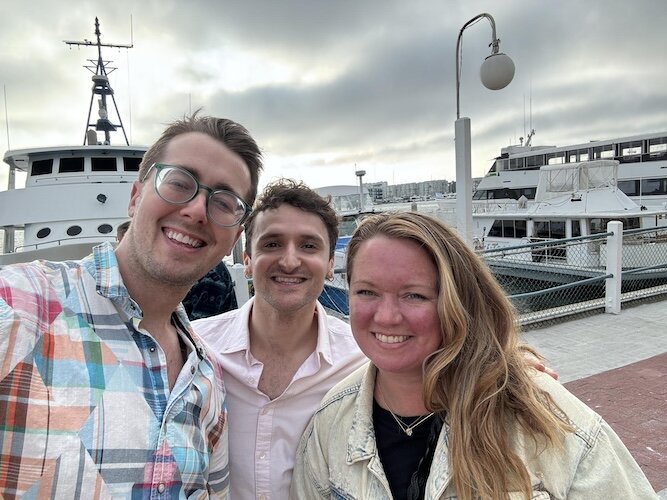 Murray with his husband, Michael Bullard, and sister, Leslie Murray