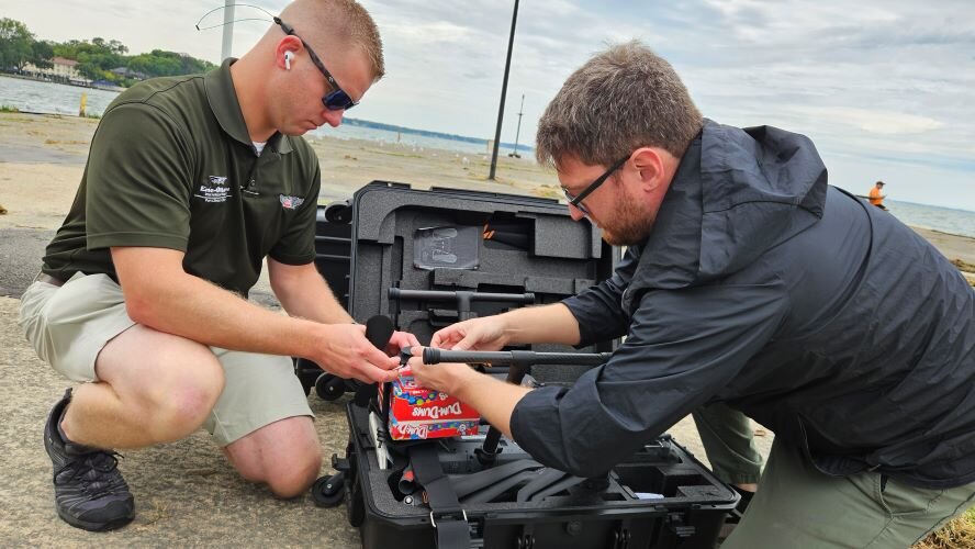 Clay Finken and Craig Iaboni set up drone for Operation Lollipop Drop.