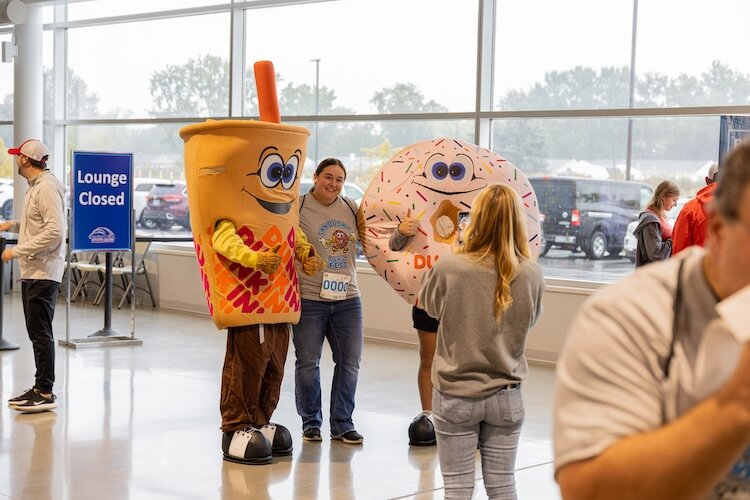 Guests enjoy a photo opp during the 2023 Donut Fest.