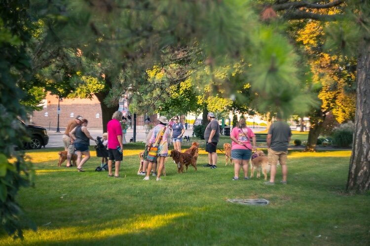 The Golden Greeters socialize in Washington Park.