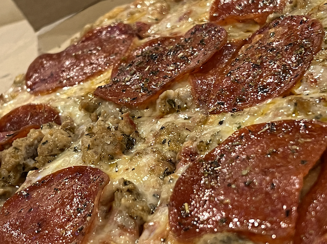 "The Lou" consists of jumbo pepperoni and Italian sausage.