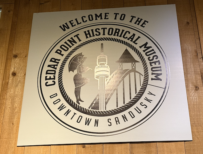 The logo of the Cedar Point Historical Museum hangs above the entrance to the museum.