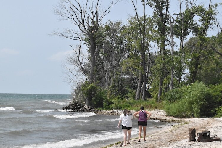 People enjoy the beach at Middle Bass Island State Park. 