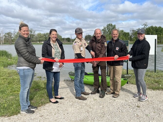 The Park District of Ottawa County hosted a ribbon cutting in May 2023 for the new Little Portage Unit Kayak Launch along the Portage River Water Trail. 
