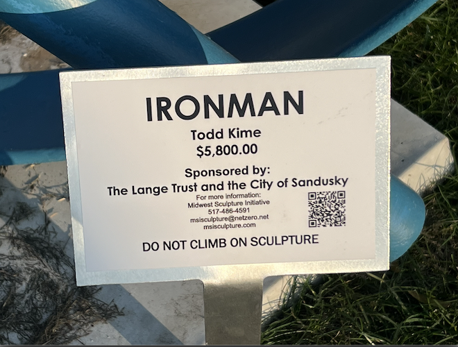 The "Iron Man" sculpture is on loan and available for purchase.