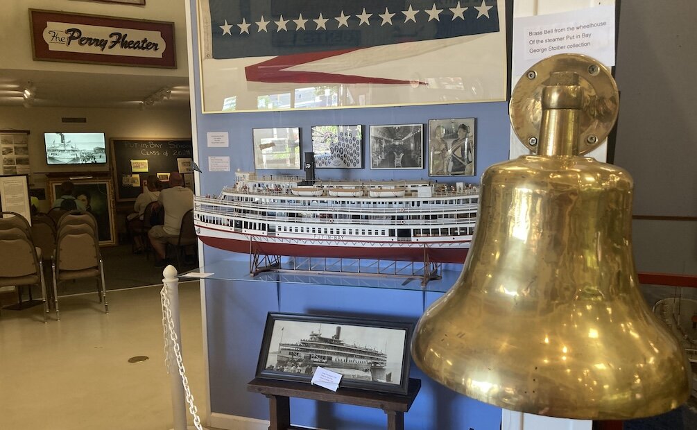 This part of the exhibit focuses on the steamer "Put-in-Bay" and includes its bell and a model of the boat. 