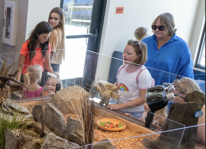 Opening day visitors enjoy the exhibits inside the new nature center.