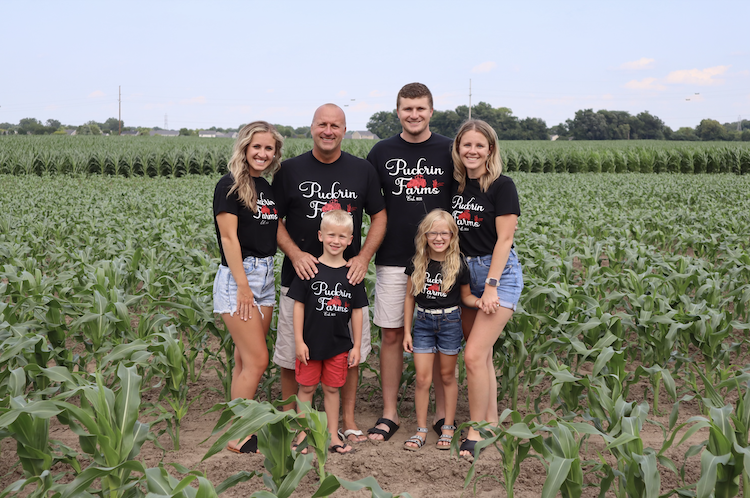 Mike Puckrin (second from left) is the seventh generation involved in the Puckrin's Farm business. His sons, Wyatt (front) and Tyler (back), will be the eighth. Also pictured are daughters Kari (far left), Kris (far right), and Addi (front).